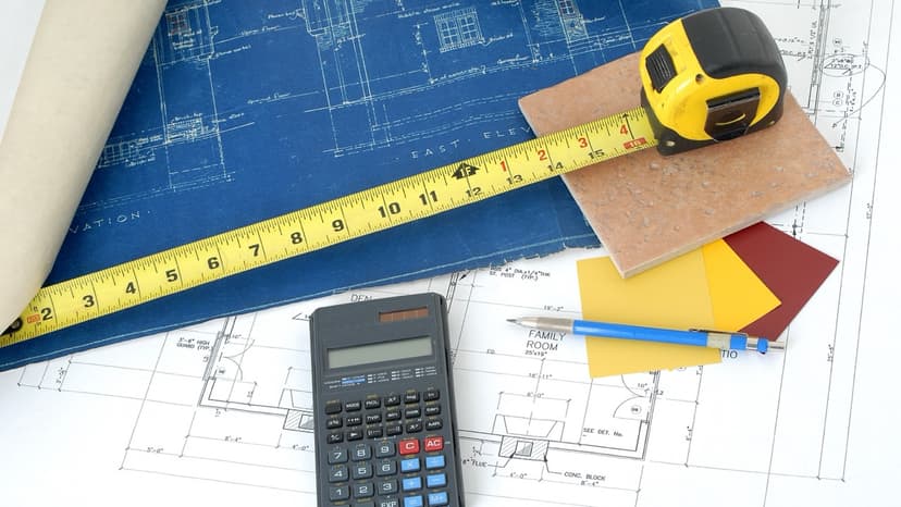 Blueprints, calculator, and measurement tools for detailed property analysis